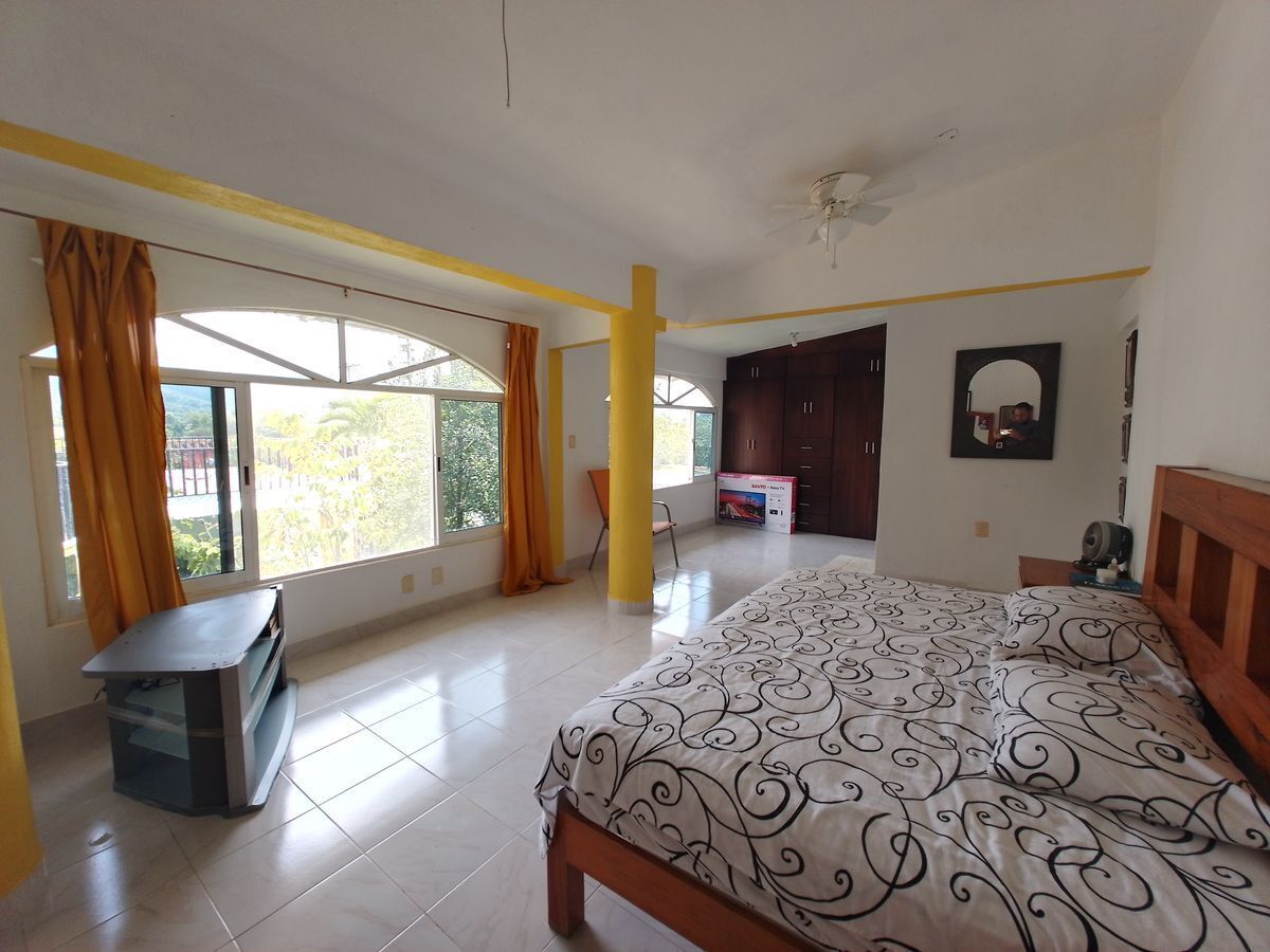 casa-estilo-campestre-en-venta-con-116657-m2-de-terreno-palapa-y-alberca20-35052